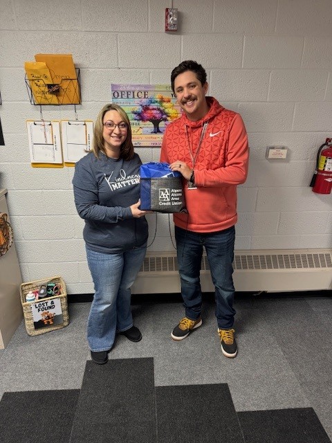 grey background with a dark grey outline of a person as a placeholder image